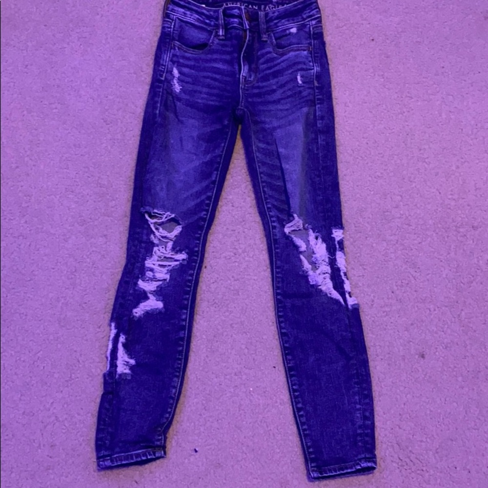 woman’s ripped jeans